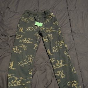 Jogging pants with dinosaurs on them